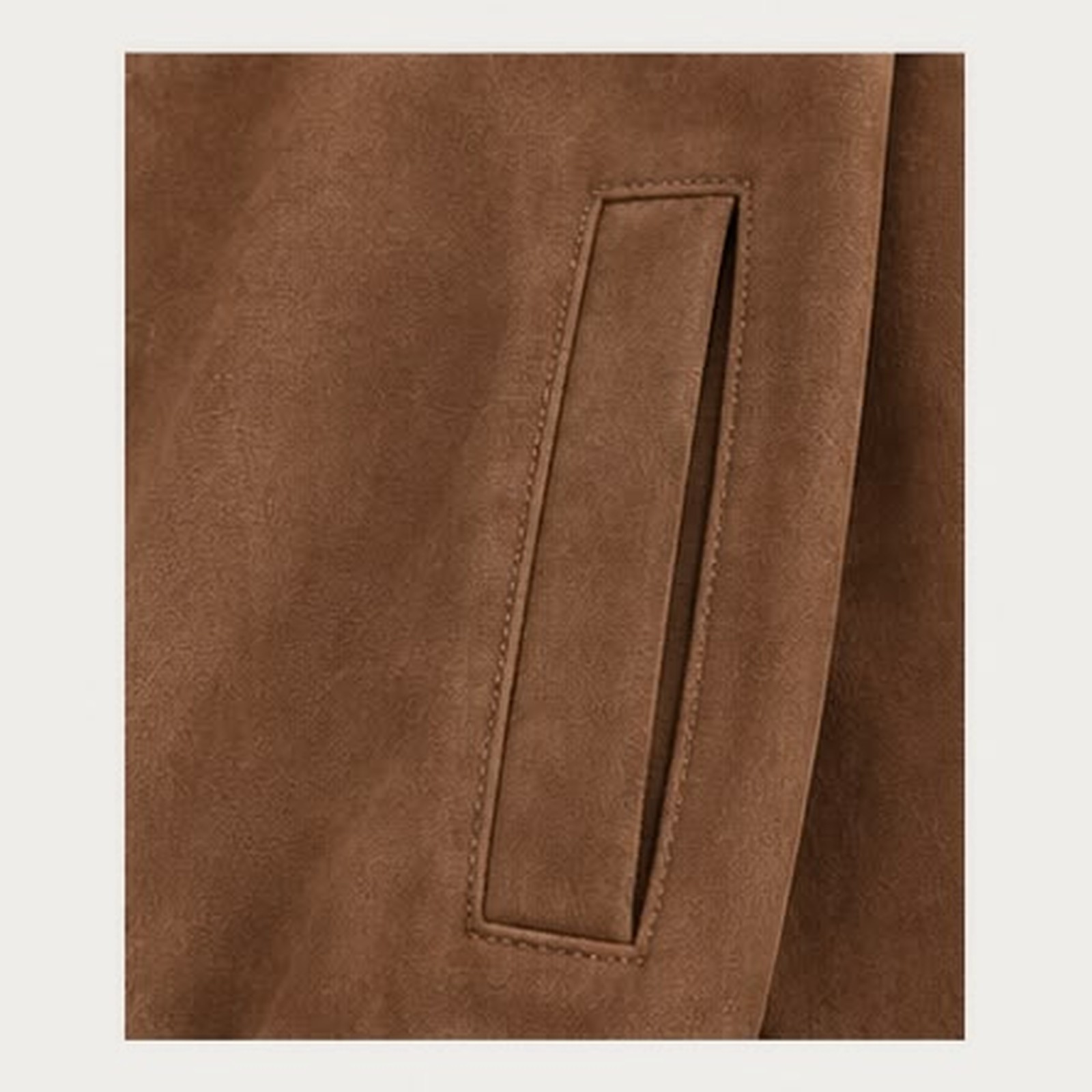 Close view of a welt pocket set into the front panel with a clean topstitched opening.